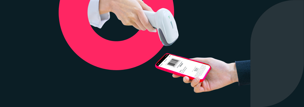 Der Handyscreen eines Barcodes wird an einen Barcodescanner gehalten.